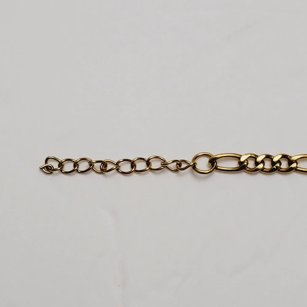 GOLD OVER STAINLESS STEEL Chain link with center hearts details
